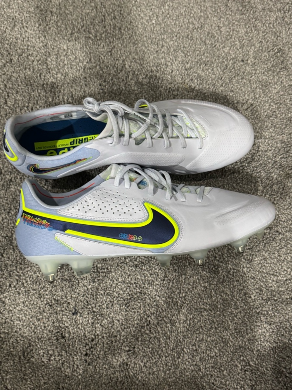 Nike White Soccer Cleats with Neon Yellow and Navy Accents
